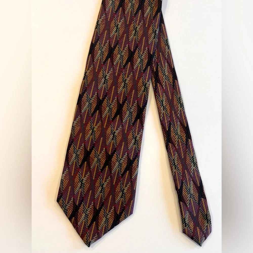 Vintage tie with price tag that has a history Jhane Barnes Abstract design